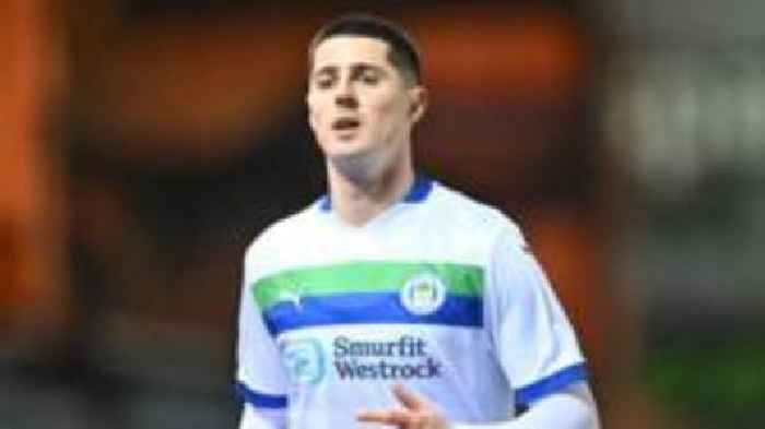 MK Dons sign defender Mellish on loan from Wigan