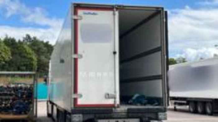Three found in back of fridge lorry, police say