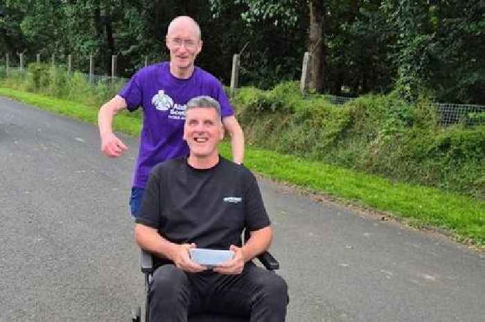 Heartwarming moment Scot completes 'wheelchair marathon' pushing mum with Alzheimer's