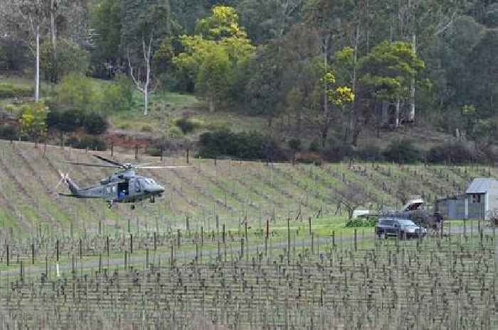 Australia police shooting suspect named as urgent manhunt enters its second day