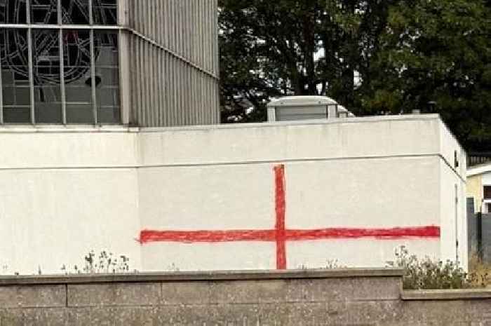 Vicar vows to keep 'nationalist' St George’s Cross graffiti off church wall