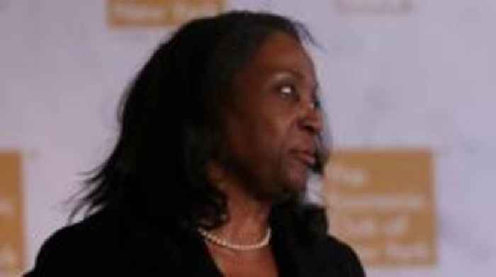 Lawyers clash over fate of Fed governor Trump tried to fire