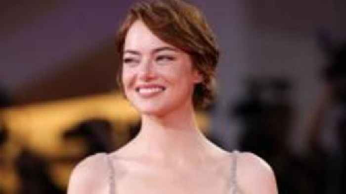 Emma Stone dazzles Venice with alien kidnap drama