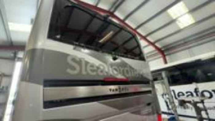 Firm 'devastated' after new bus pelted with rocks