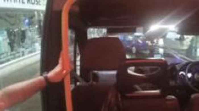 Man arrested after taxi driver racially abused