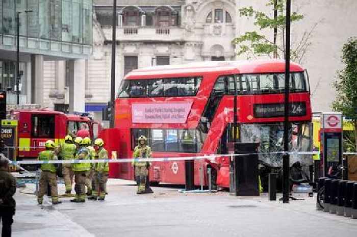 Several injured after London bus mounts pavement near major station