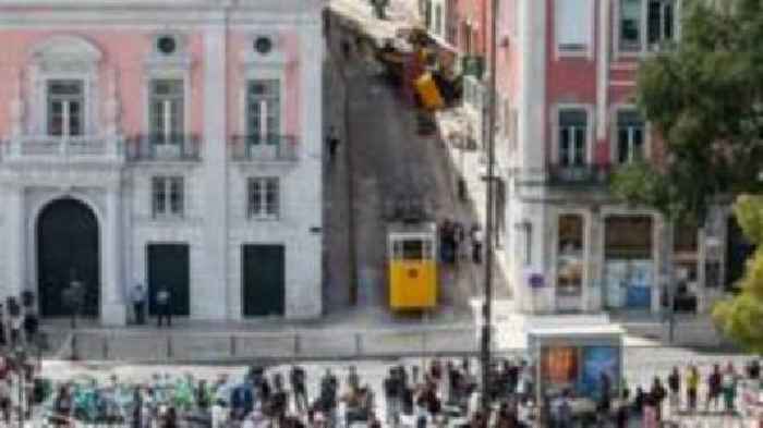 Boy, 3, pulled from funicular crash that has shocked Portugal