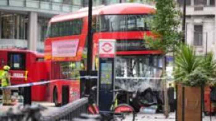 Injuries as bus mounts pavement in central London