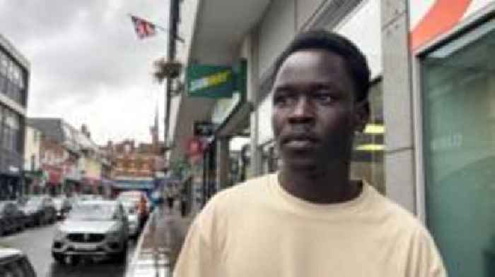 Refugee says national flags do not intimidate him