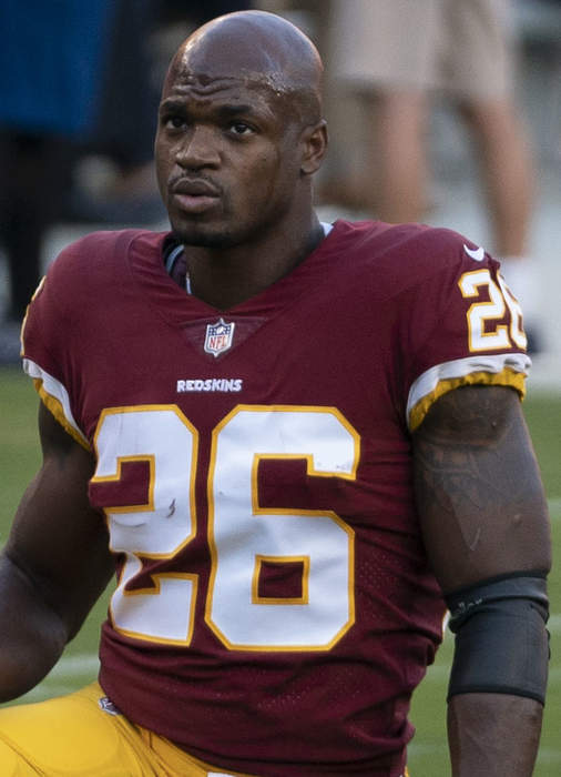 Tennessee Titans waive Adrian Peterson after three games, add Golden Tate to practice squad
