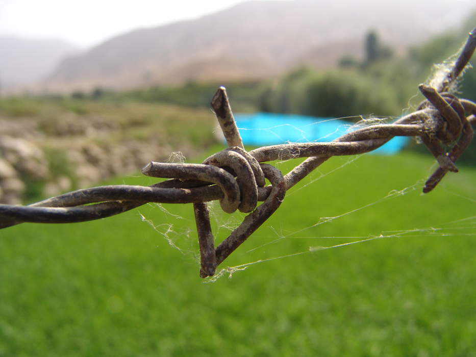 George Floyd Trial Courthouse Barricaded with Barbed Wire, Fencing