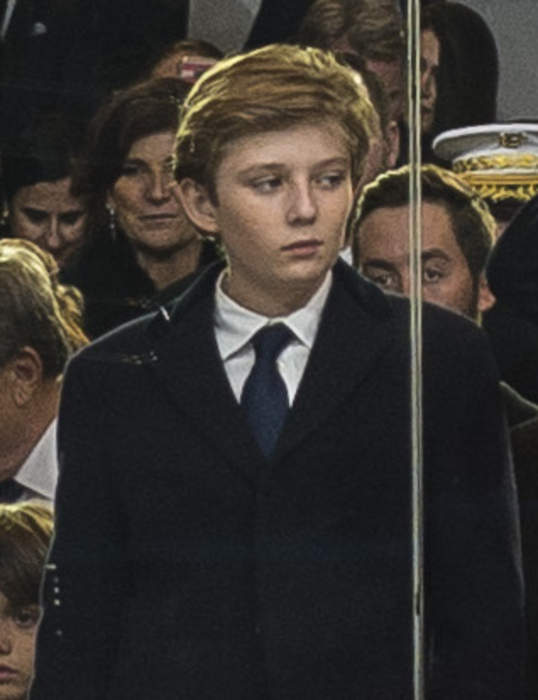 Barron Trump Makes Debut at His Father's Rally for President
