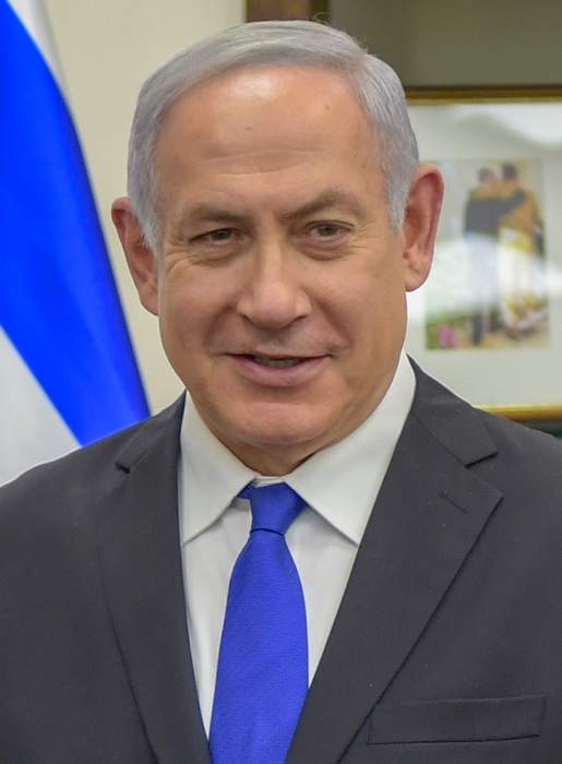Benjamin Netanyahu's corruption trial resumes with brief appearance by Israeli PM, protest