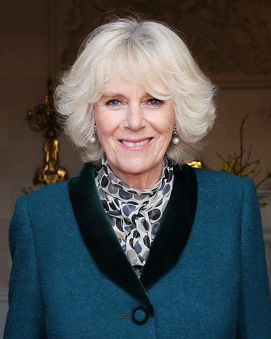 King Charles and Queen Camilla greet guests at Buckingham Palace Garden Party