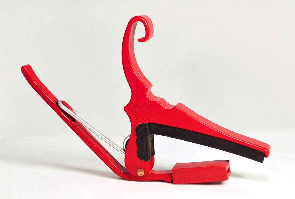 Capo (musical device)