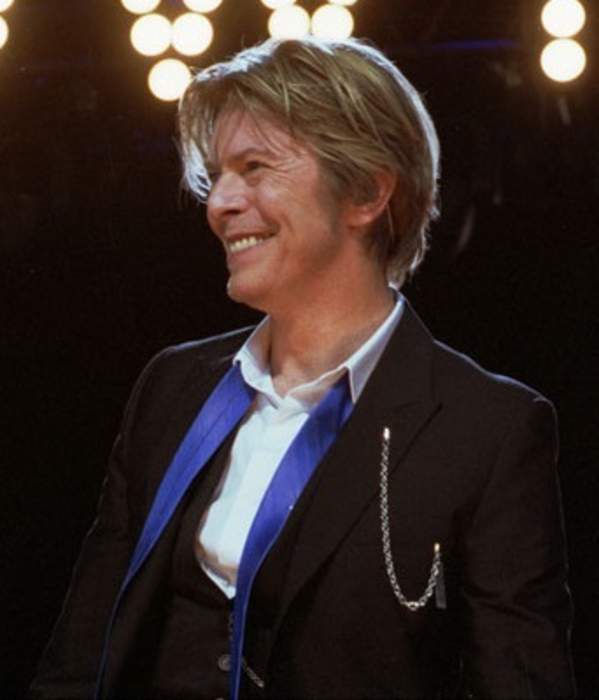 David Bowie's suit with cigarette burns only fetches £8k