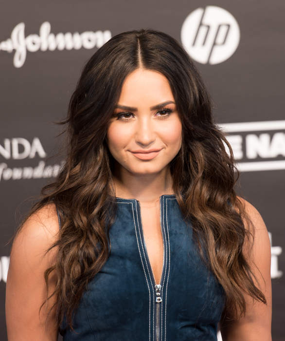 Demi Lovato says she cut her hair because she 'used to hide behind' it