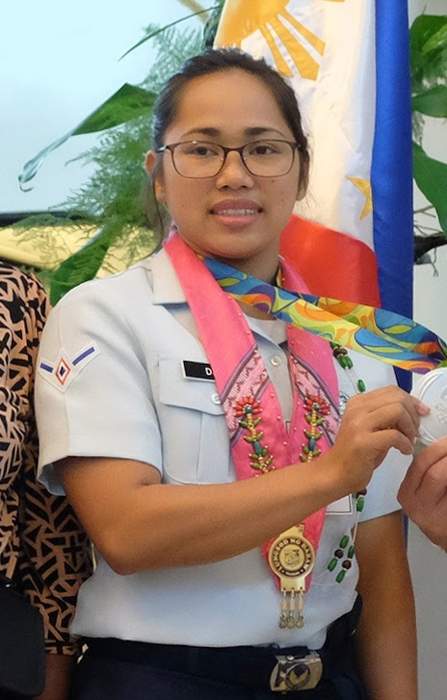 Weightlifter Hidilyn Diaz wins Philippines' first Olympic gold medal, 2 houses and $660,000
