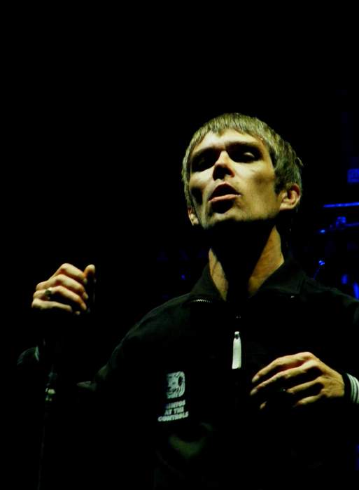 Ian Brown steps down from festival over vaccine