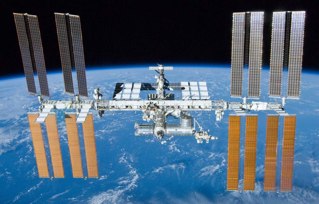 Spacewalking astronauts perform six-hour long repair on the International Space Station