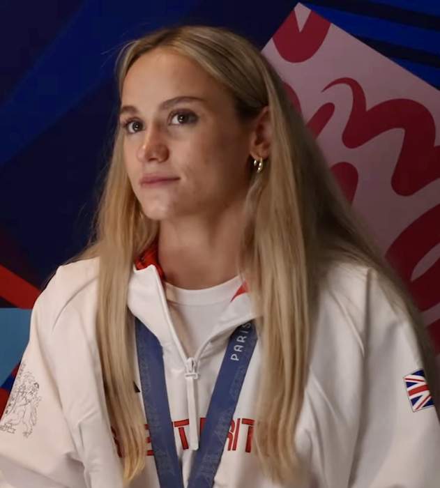 Swimmer misses graduation to win bronze medal