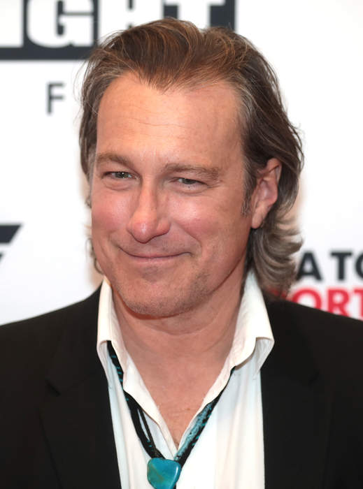 John Corbett and Bo Derek secretly wed last year after two decades together: 'Forgot to tell you!'