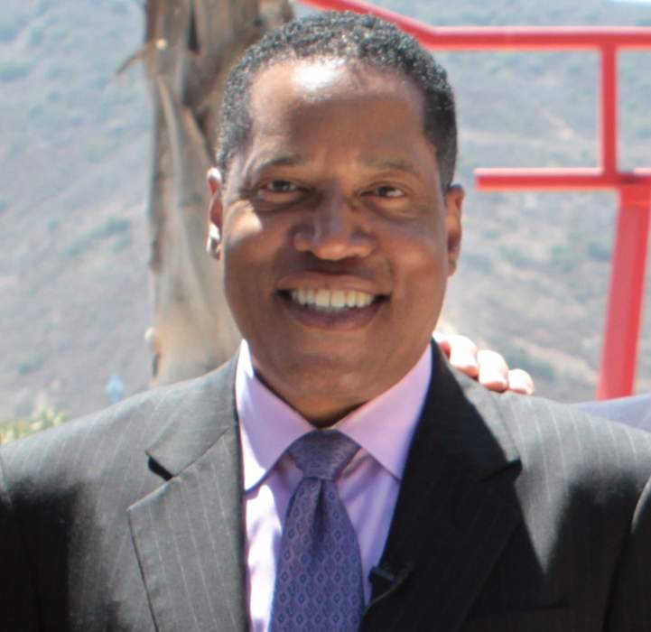 Critics slam 'racist' woman in gorilla mask who launched egg at Larry Elder, became violent