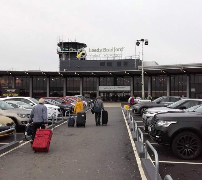 Airport queue chaos leaves passengers in tears