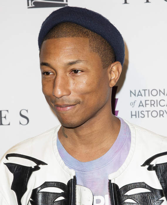 Pharrell Surprises NAACP Student Leaders, Pays Their Student Debt