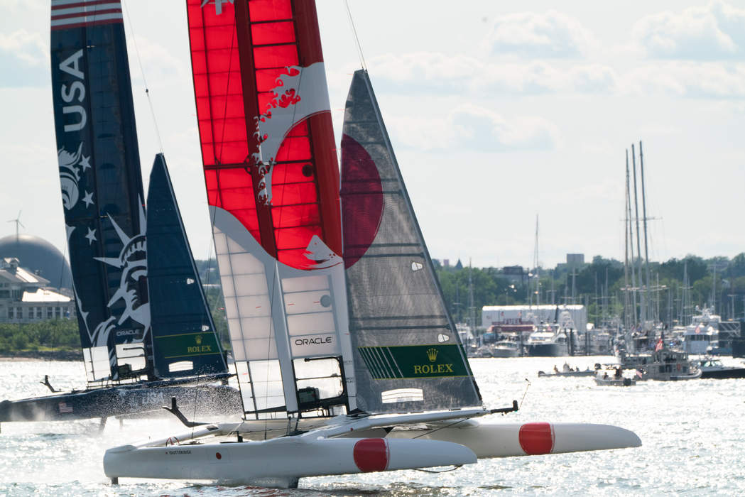 Scary moment boat tips over in SailGP