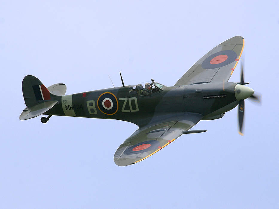 Spitfire crashes in field near RAF station