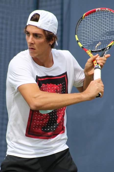 Kokkinakis grills umpire at change of ends