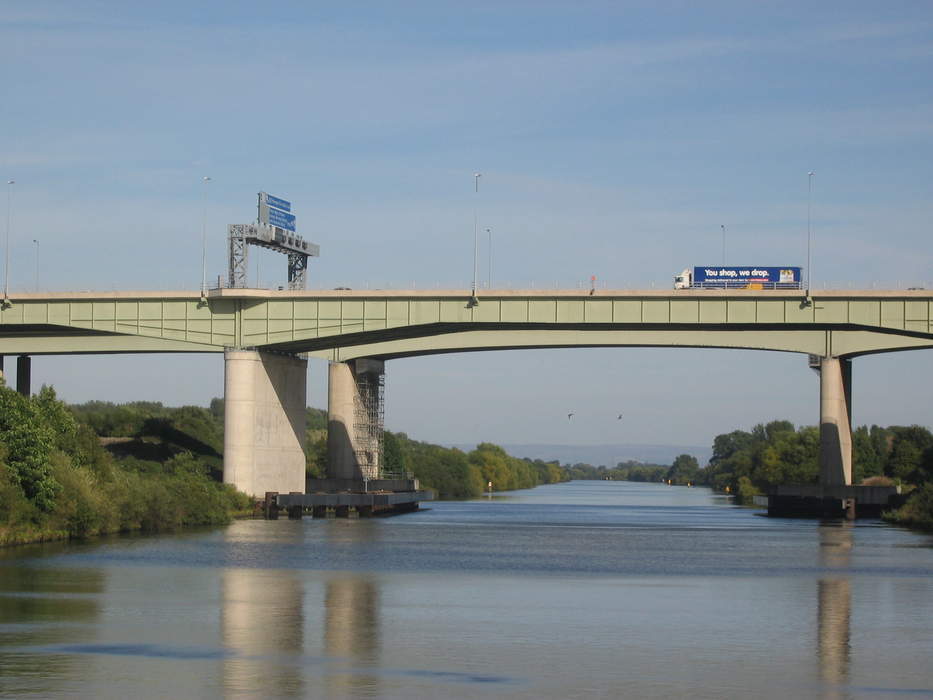 Lorry falls 60 metres from motorway bridge