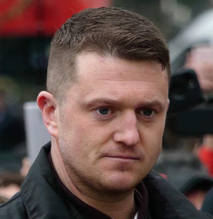 Tommy Robinson charged after attending antisemitism march in London