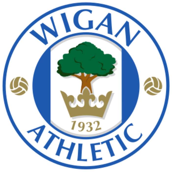 Wigan beat Huddersfield to go top of Super League