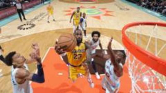 James' triple-double helps Lakers see off Spurs