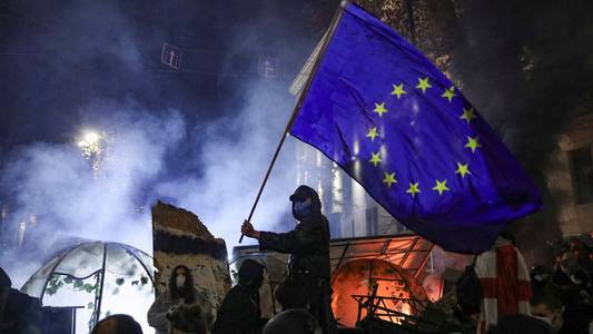 Georgian president says government 'not legitimate' as thousands again take to streets