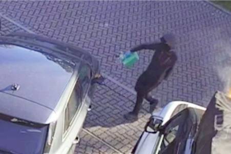 Family targeted in gang war demand to be left in peace as new images of masked hoods emerge