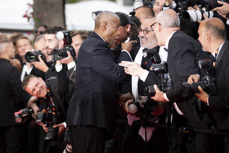 WATCH: Denzel Washington Yells at Photographer After Being Grabbed on Cannes Red Carpet: ‘Stop!’