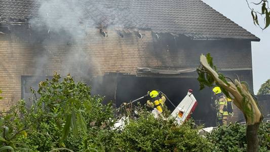 Plane crashes into house, killing two people