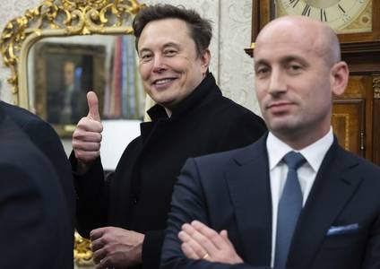 Elon Musk Unfollows Stephen Miller After Hiring His Wife Away from the White House