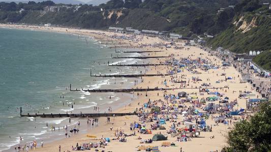 UK 'to be hotter than Barbados' with temperatures set to hit a record-breaking 34C