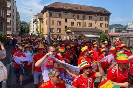 Thousands of marching Wales fans bring Swiss city streets to standstill in stunning scenes