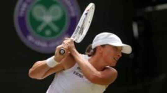 Swiatek into maiden Wimbledon semi-final
