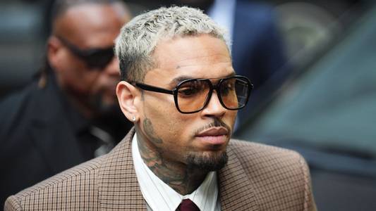 Chris Brown pleads not guilty to lesser assault charge following alleged bottle attack