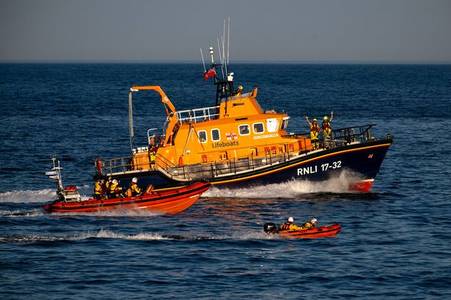 Man dies after being 'blown into the side of a yacht' in windsurfing tragedy at popular beach