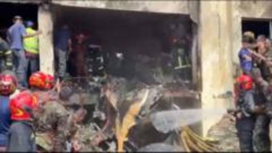 Bangladesh plane crash: 'I heard an explosion, saw fire'