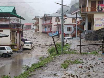News24 | 4 dead, race to rescue survivors after flash flooding hits India