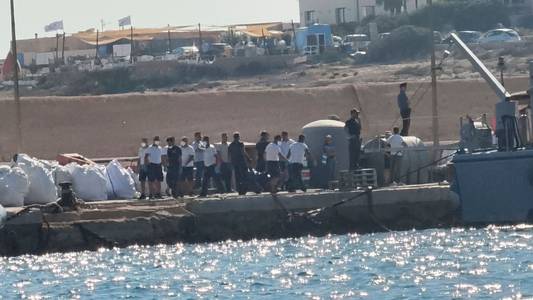 At least 26 dead and around a dozen missing after migrant boat capsizes off coast of Italian island